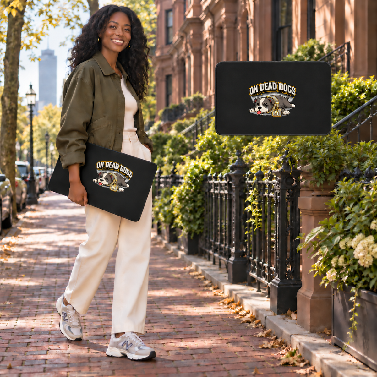 Black adult woman in Boston with enlarged On Dead Dogs artwork on an 18 by 12 inch desk mat and floating product view