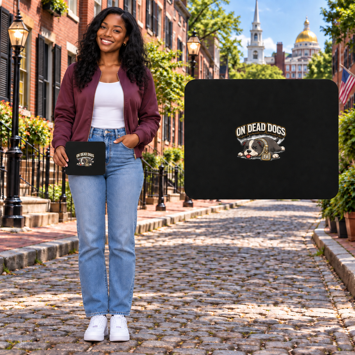 Black adult woman posing in Boston with the black On Dead Dogs rectangular mouse pad and floating product view