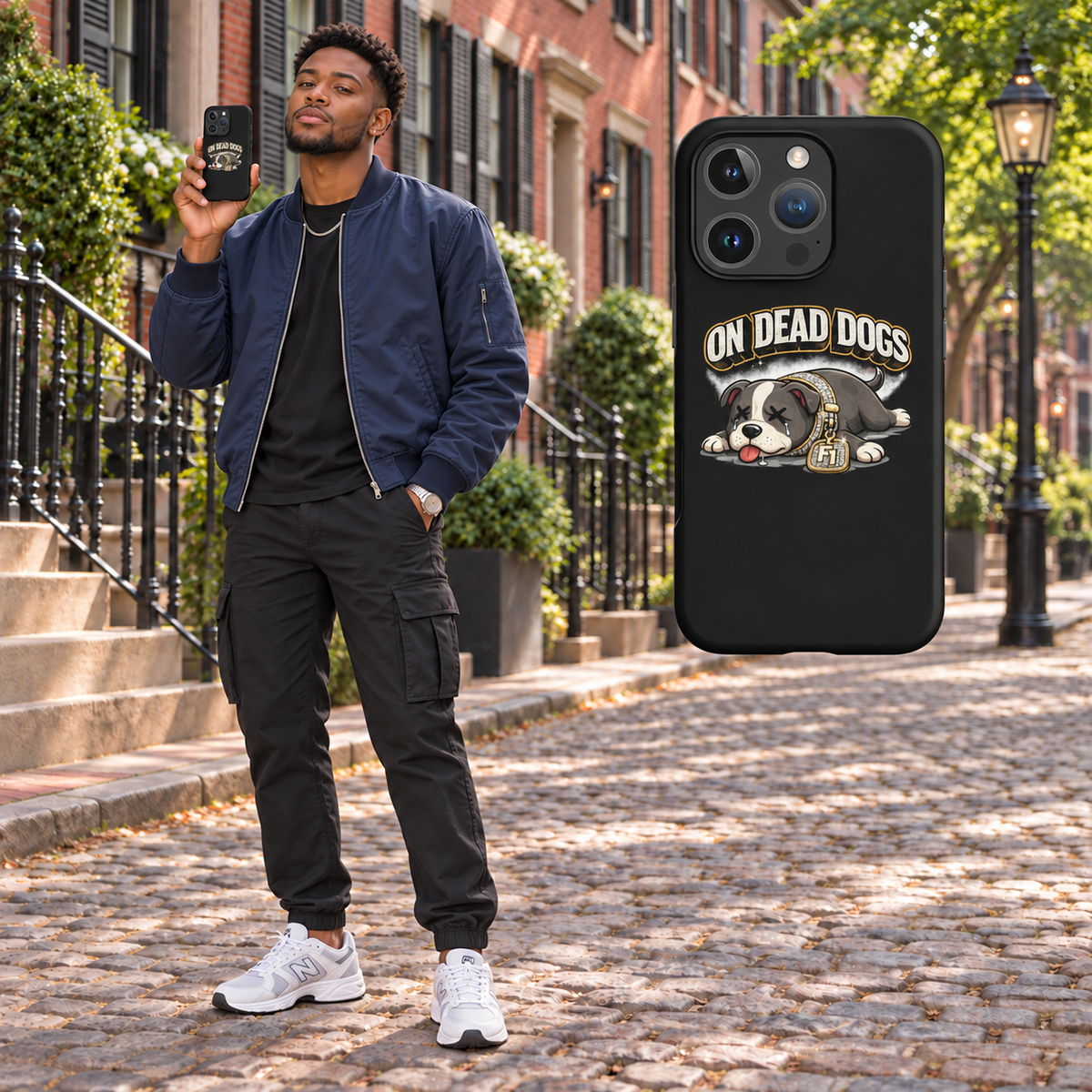 Black adult model holding On Dead Dogs matte snap iPhone 16 Pro case in Boston, with matching floating case