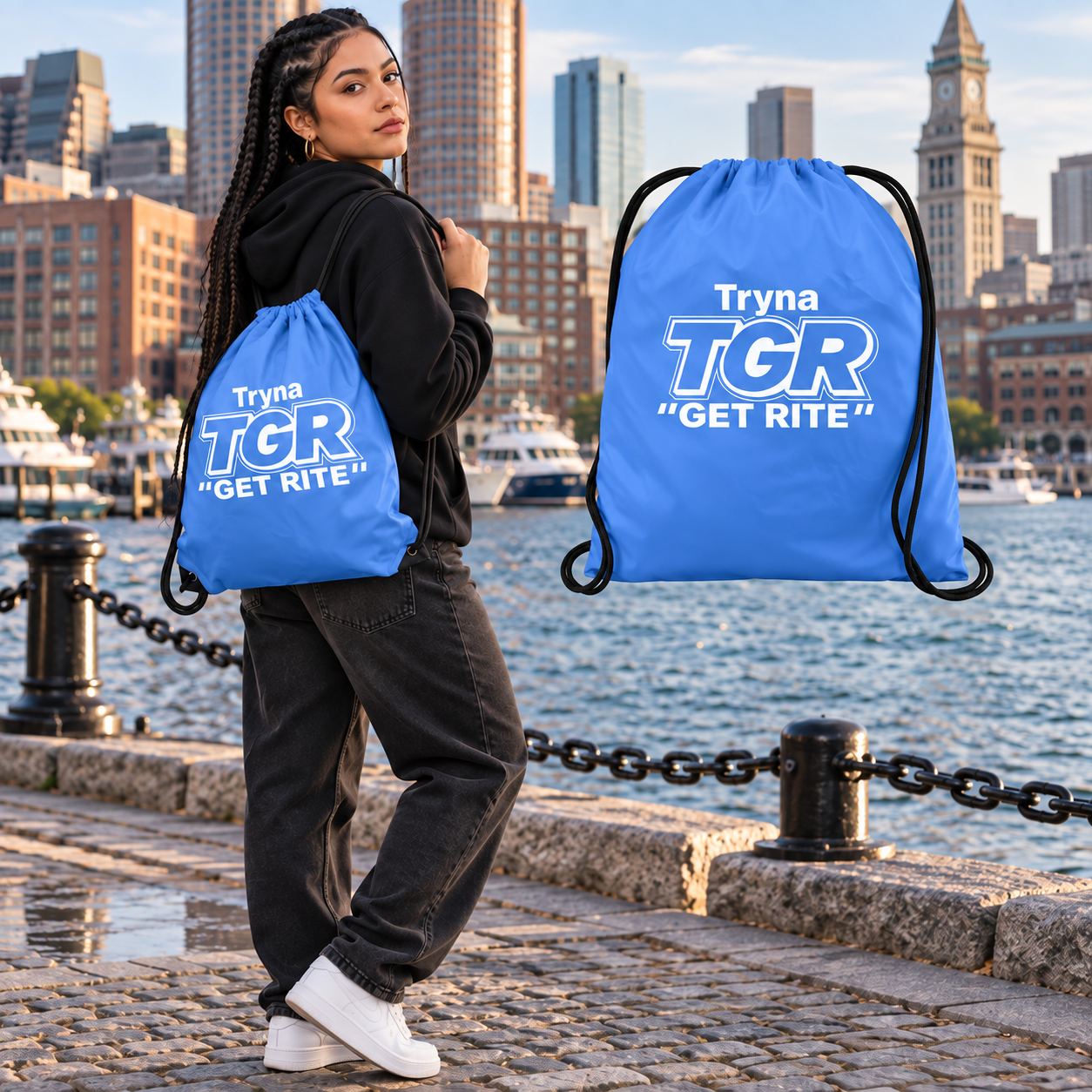 Model carrying the Carolina Blue TGR bag beside its matching floating bag in Boston
