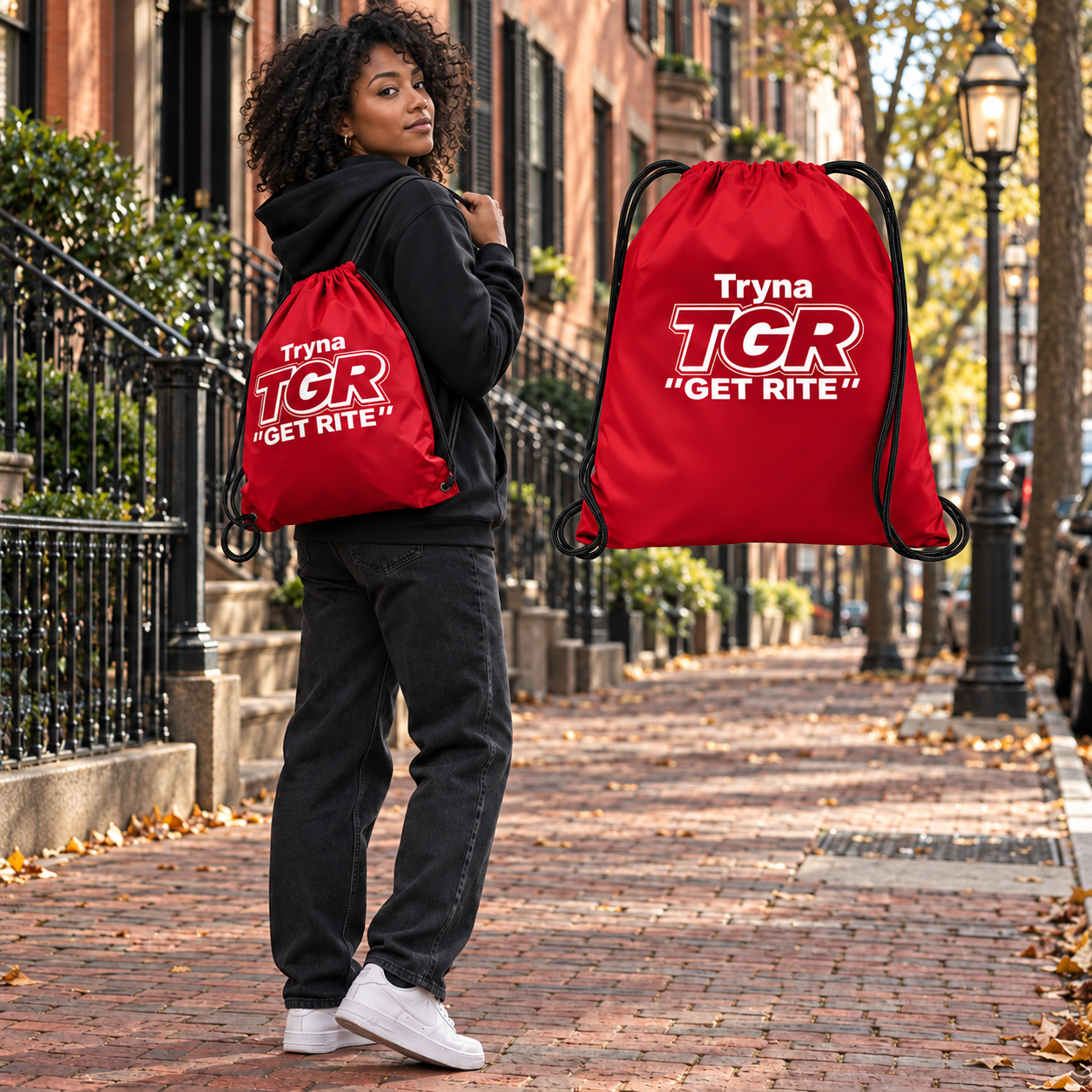 Model carrying the True Red TGR bag beside its matching floating bag in Boston