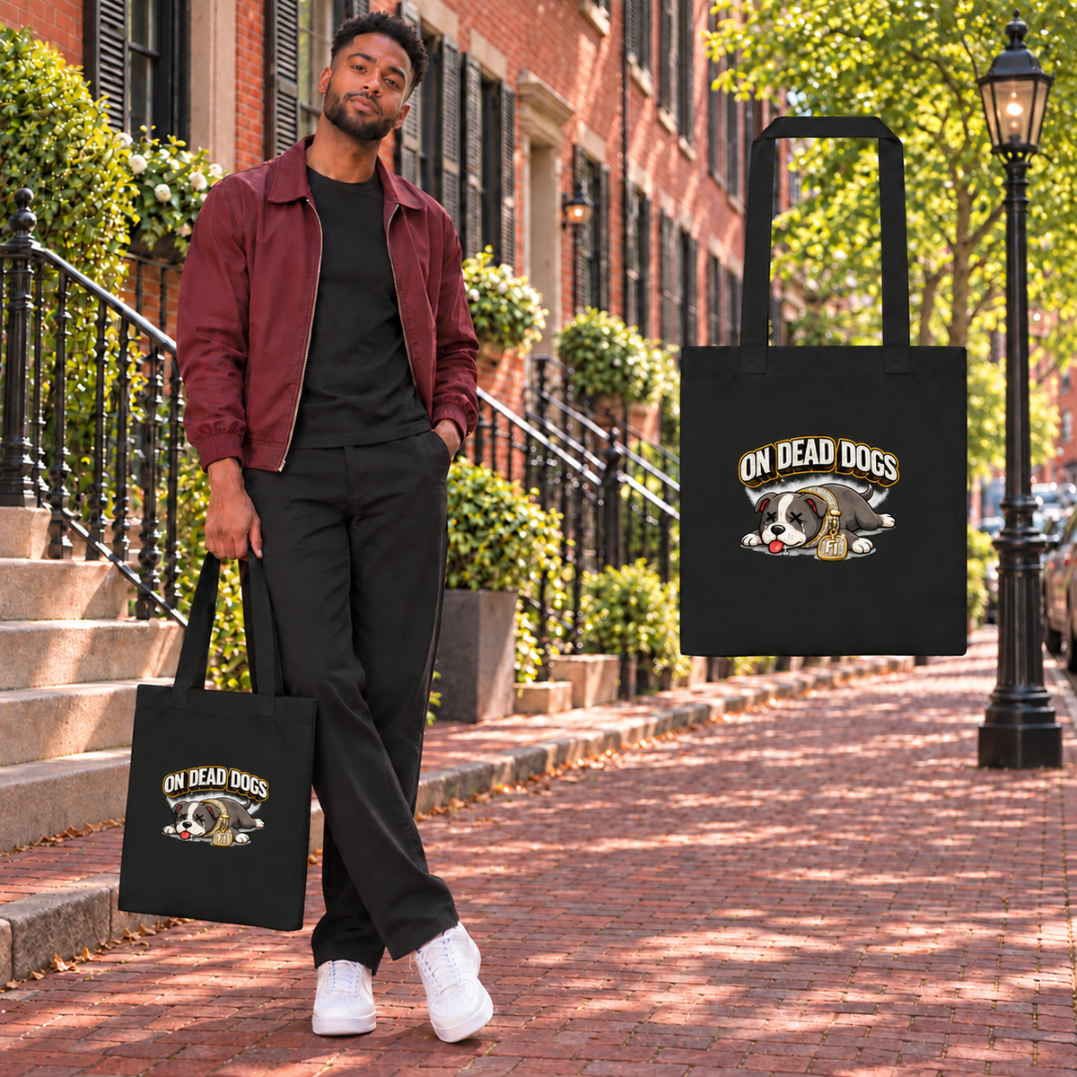 Black adult model in Boston with On Dead Dogs cotton tote and matching enlarged front graphic