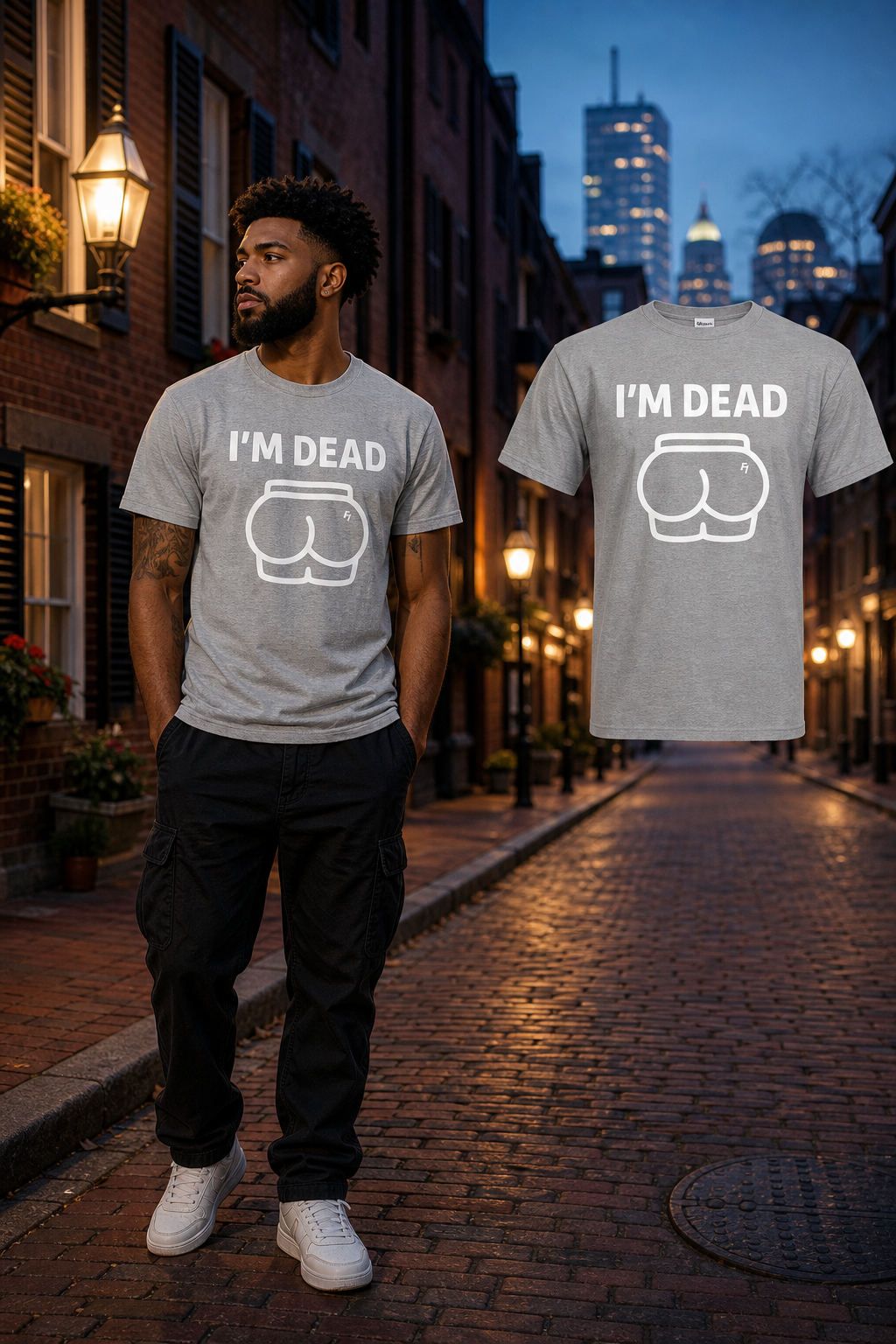 Black male model wearing the Sport Grey Im Dead T-shirt beside the matching shoulder-level floating garment on a Boston brick street