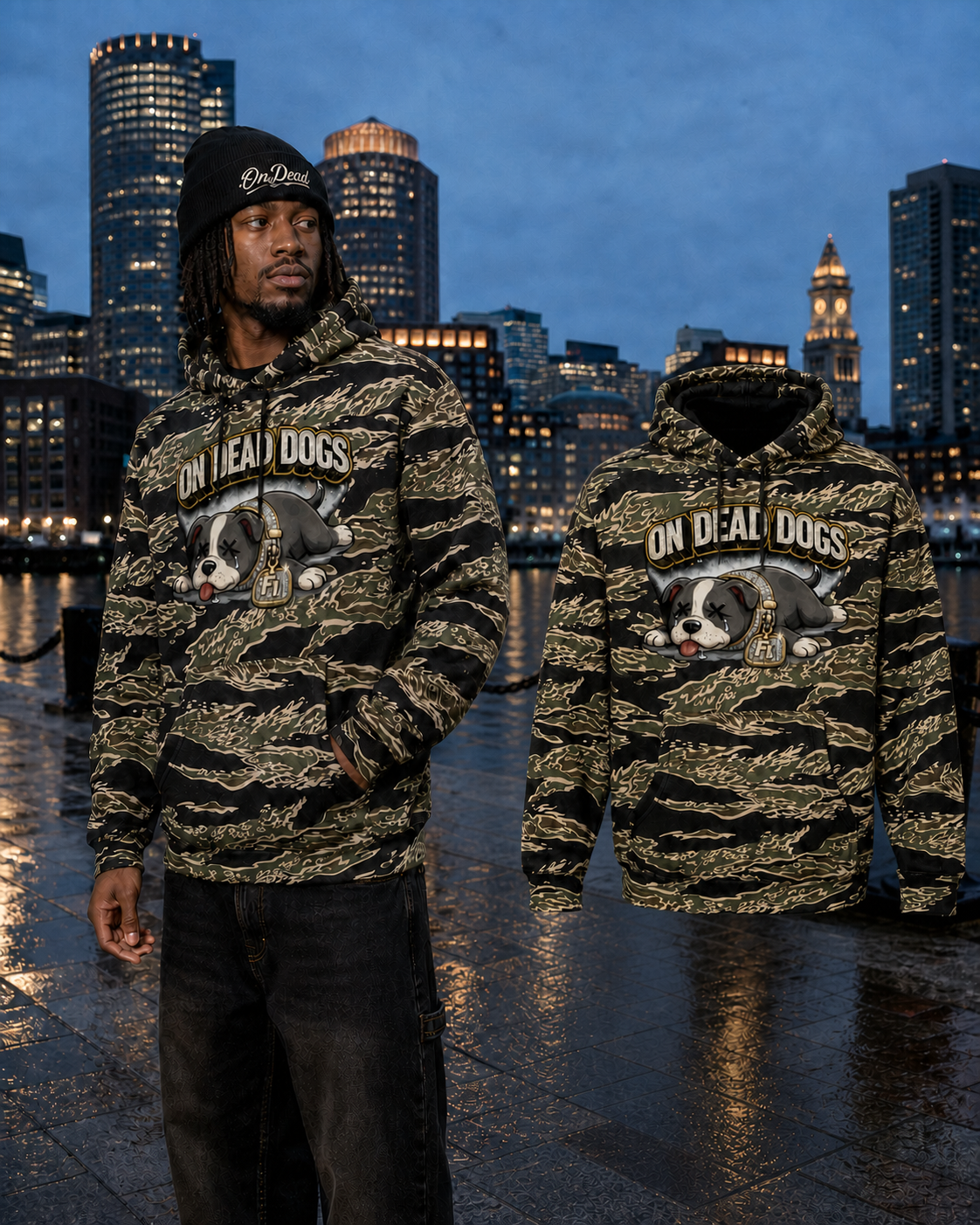 Black model wearing the Tiger Camo On Dead Dogs hoodie beside the matching garment in Boston