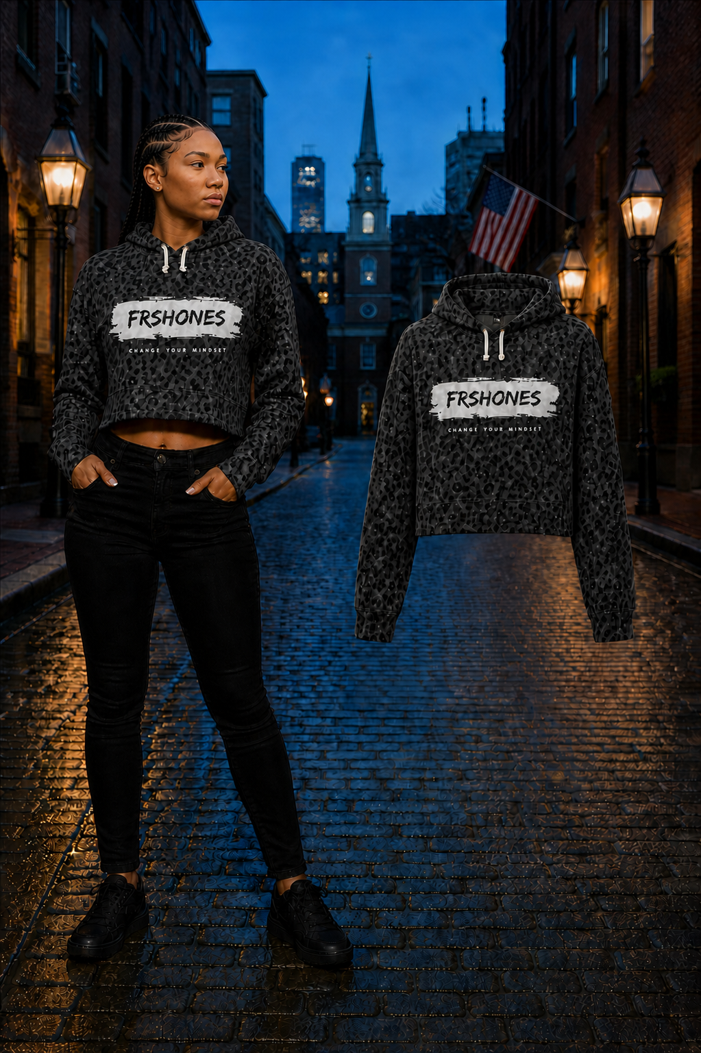 Female model wearing the Black Leopard Stroke of Genius cropped hoodie beside the matching floating garment on a Boston street