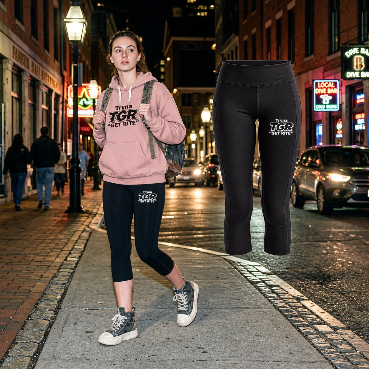 Original TGR leggings model wearing the Desert Pink TGR hoodie beside matching floating black leggings on a Boston street
